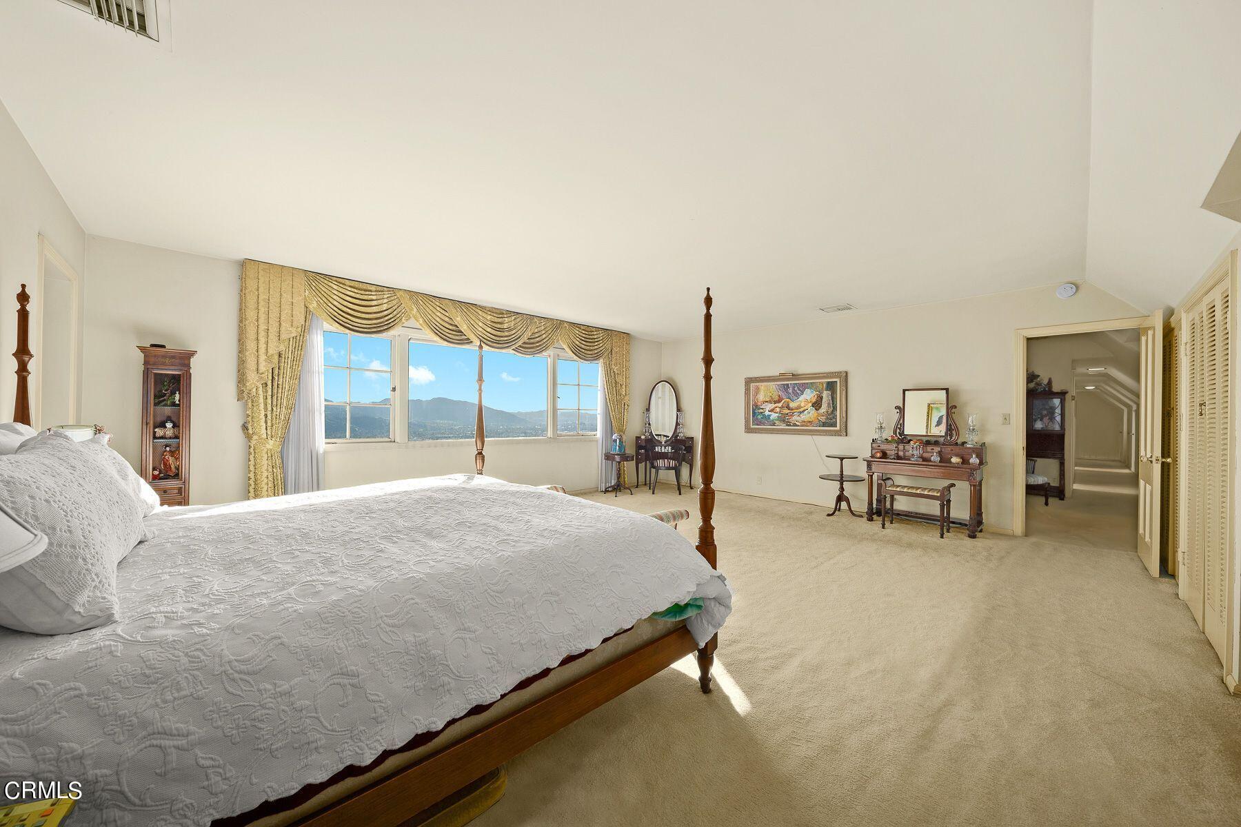 1826 Ransom Road Glendale, CA 91201 - Photo 35 of 61 a bed room with a bed and a large window