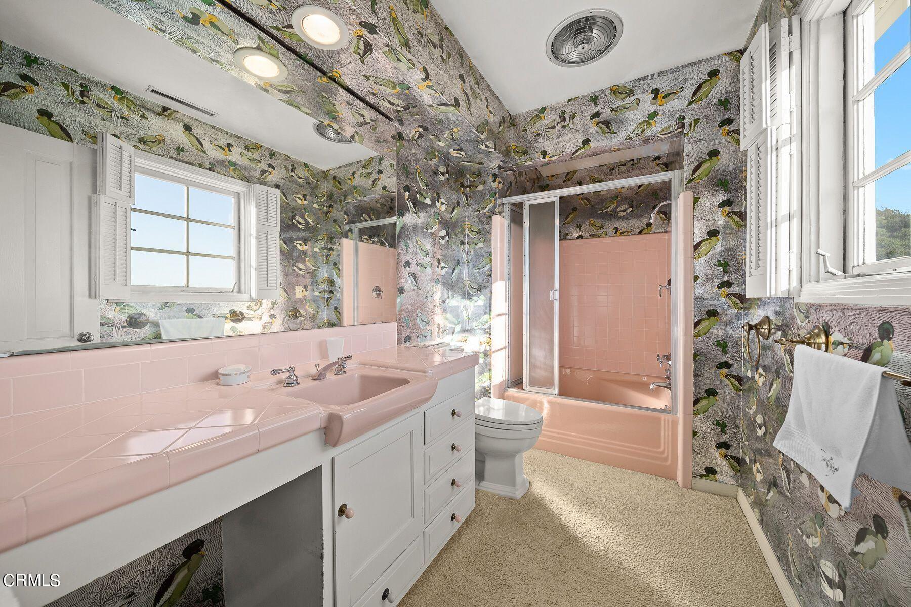 1826 Ransom Road Glendale, CA 91201 - Photo 43 of 61 a spacious bathroom with a double vanity sink mirror and a bathtub