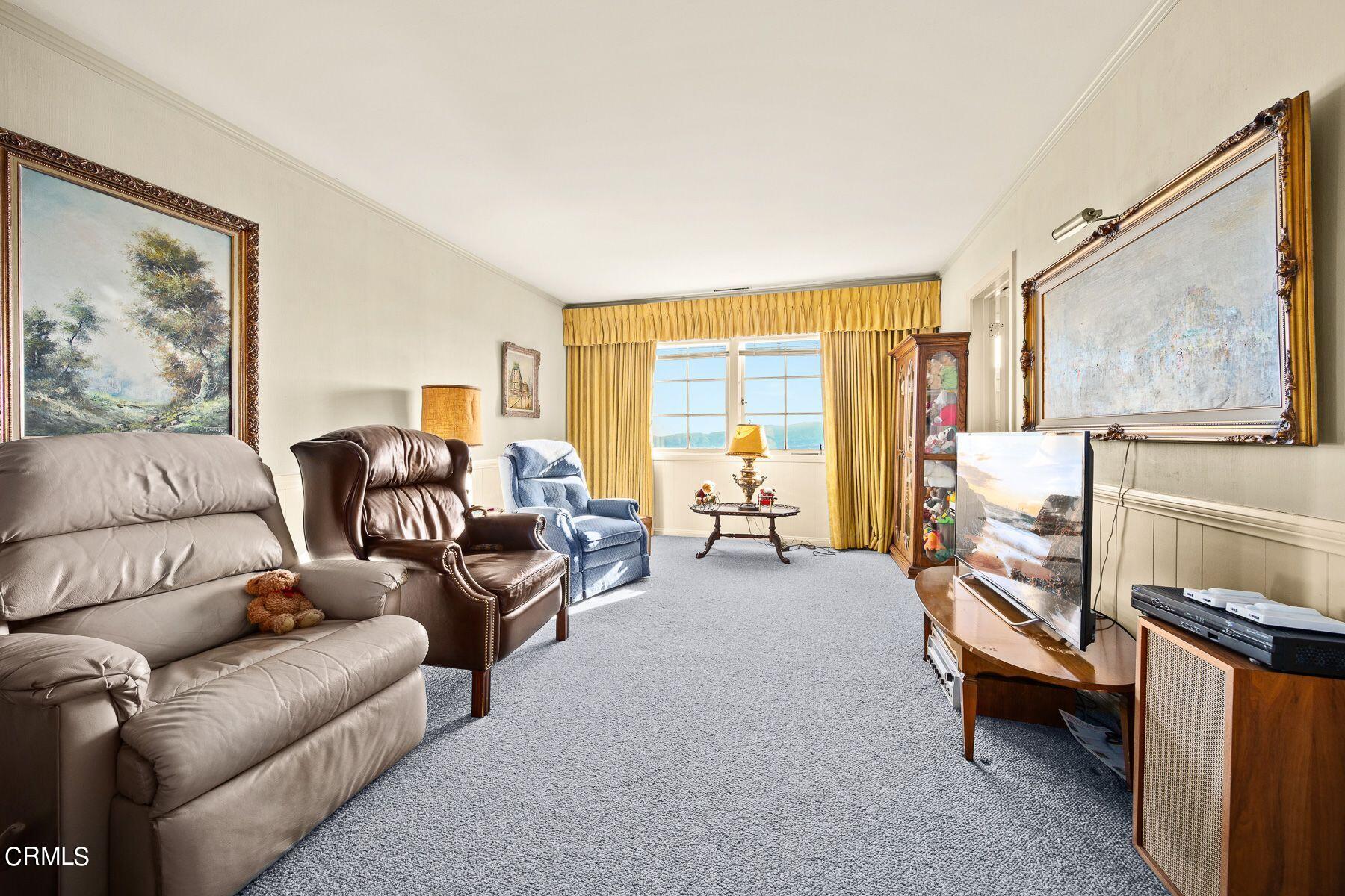 1826 Ransom Road Glendale, CA 91201 - Photo 44 of 61 a living room with furniture and a flat screen tv