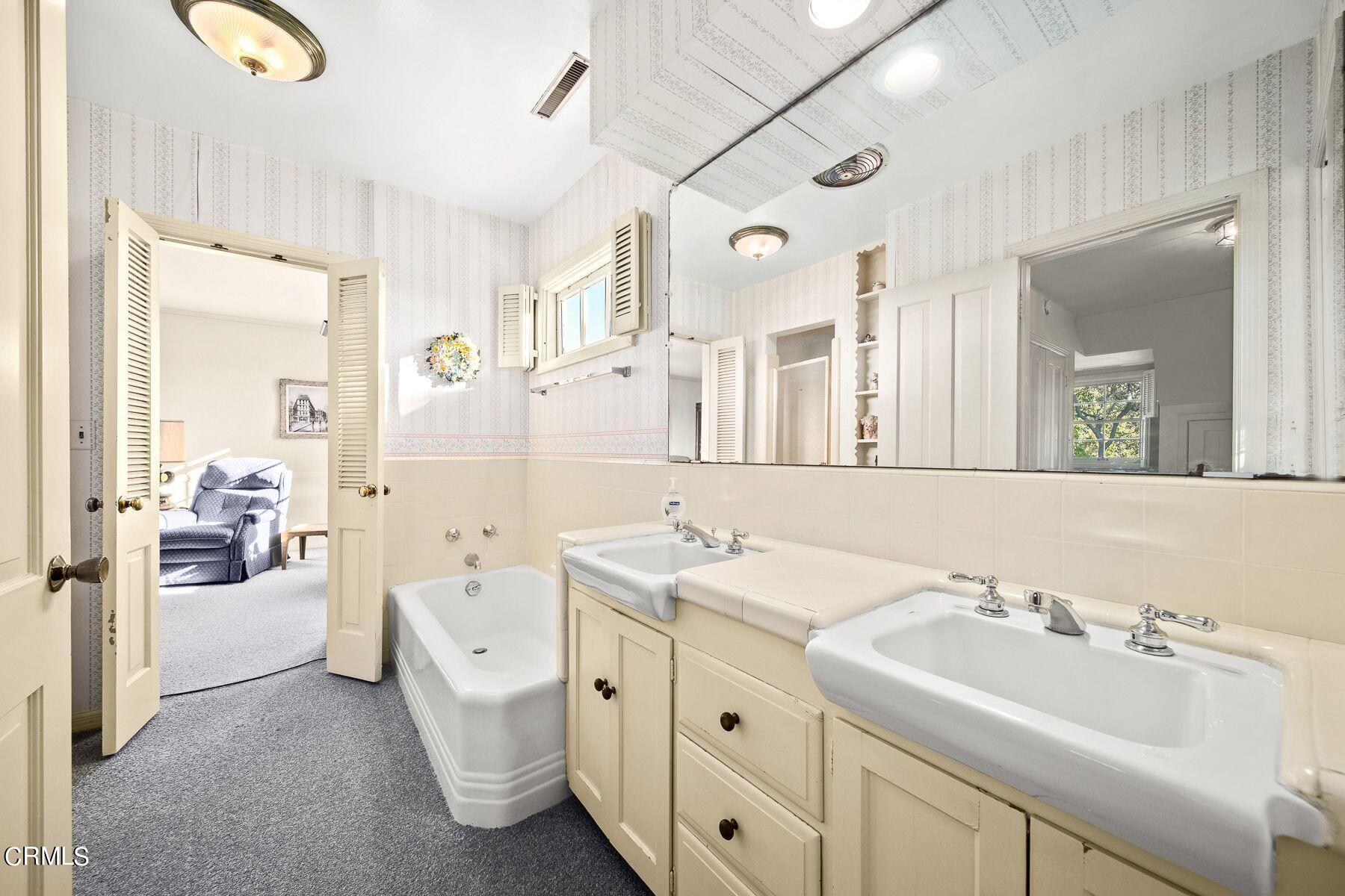 1826 Ransom Road Glendale, CA 91201 - Photo 45 of 61 a spacious bathroom with a double vanity sink mirror and