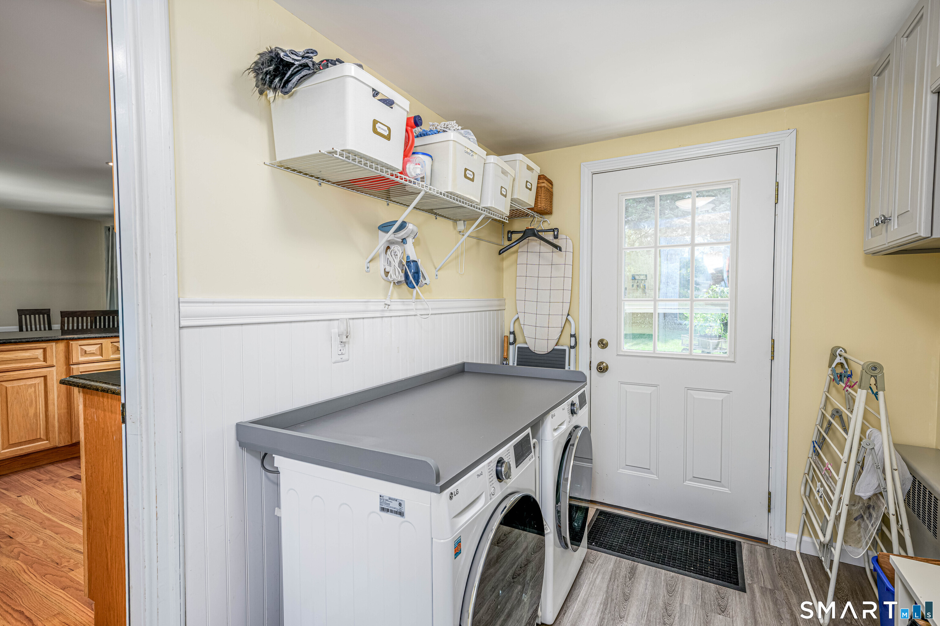 25 Wright Lane Hamden, CT 06517 - Photo 18 of 38 Bright laundry/mud room with access to the front and backyard.