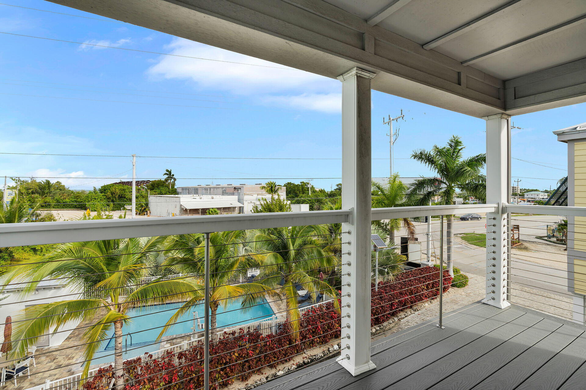 101 11th Street, Unit 19 Marathon, FL 33050 - Photo 18 of 27 a view of a balcony with chairs