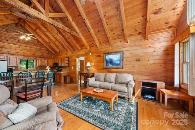 a outdoor living space with patio furniture and a fireplace