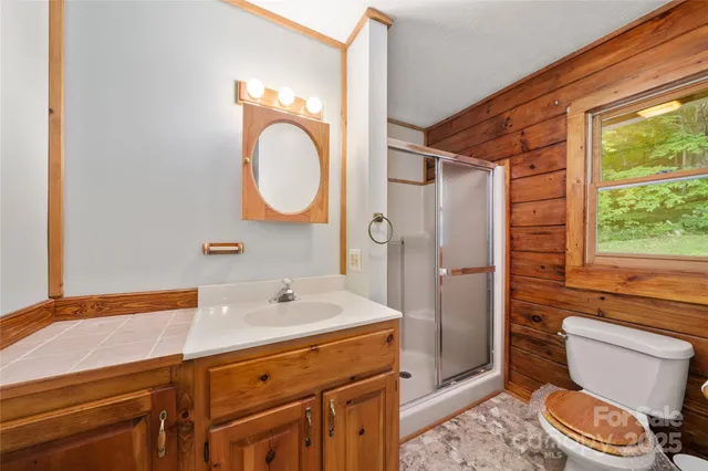 a view of a livingroom with furniture and wooden floor