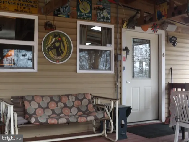 a stove top oven sitting inside of a kitchen