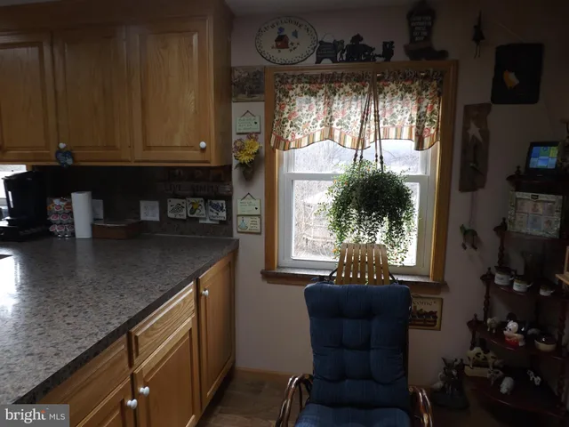 a room with gym equipment and a large window