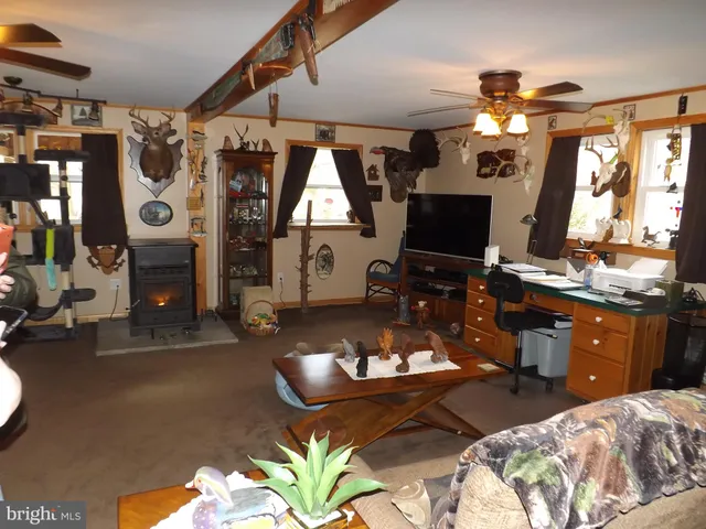 a bedroom with bed and window