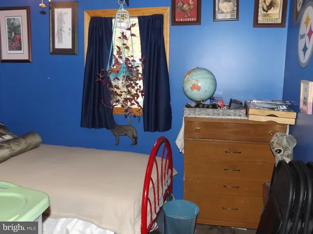 a bathroom with a toilet and a sink