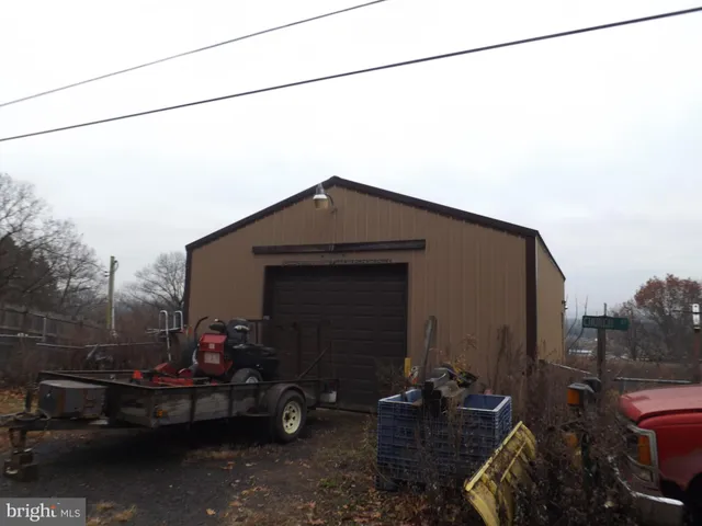 a backyard of a house with seating space