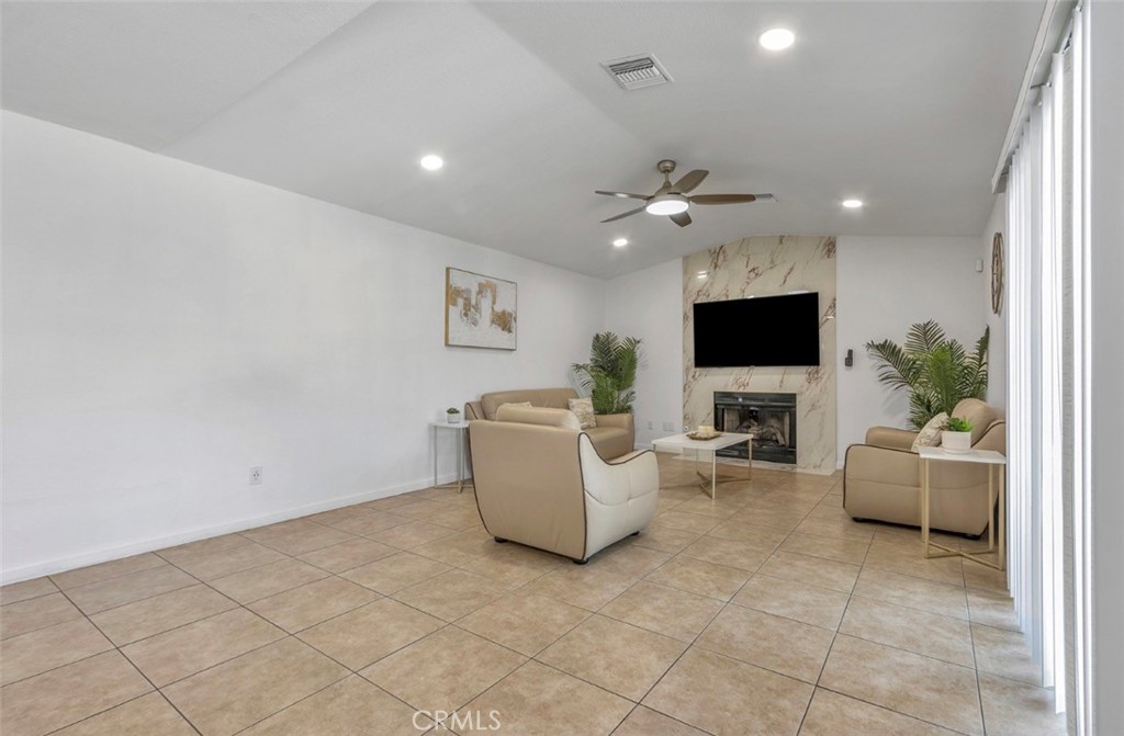 2230 North Volturno Road Palm Springs, CA 92262 - Photo 11 of 34 a living room with furniture and a flat screen tv