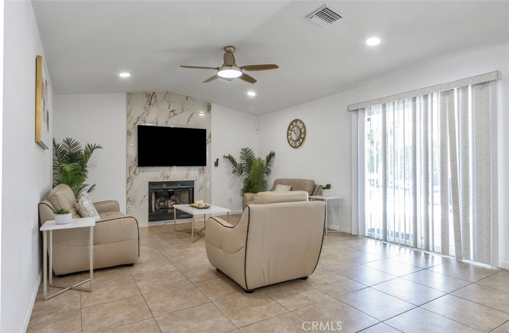 2230 North Volturno Road Palm Springs, CA 92262 - Photo 12 of 34 a living room with furniture and a flat screen tv