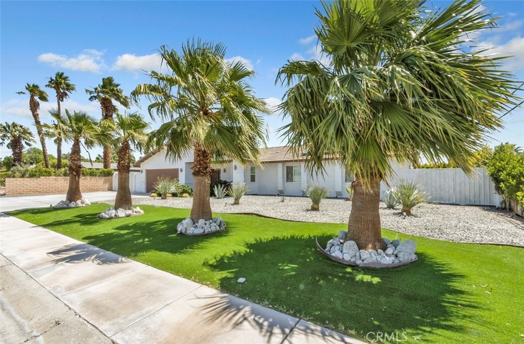 2230 North Volturno Road Palm Springs, CA 92262 - Photo 3 of 34 a front view of a house with garden