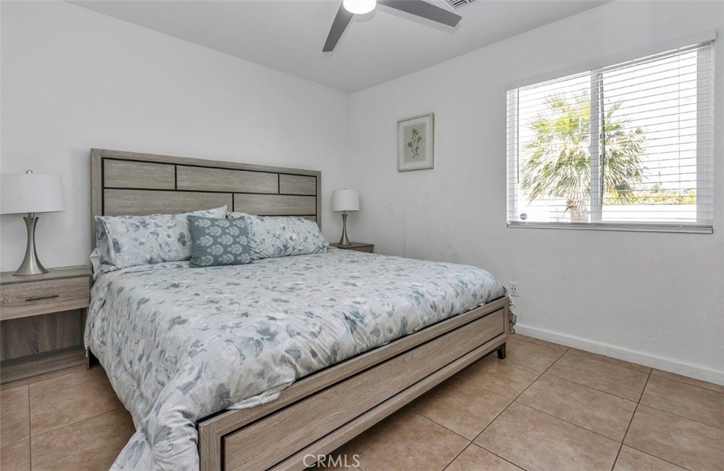 2230 North Volturno Road Palm Springs, CA 92262 - Photo 32 of 34 a bedroom with a bed and window