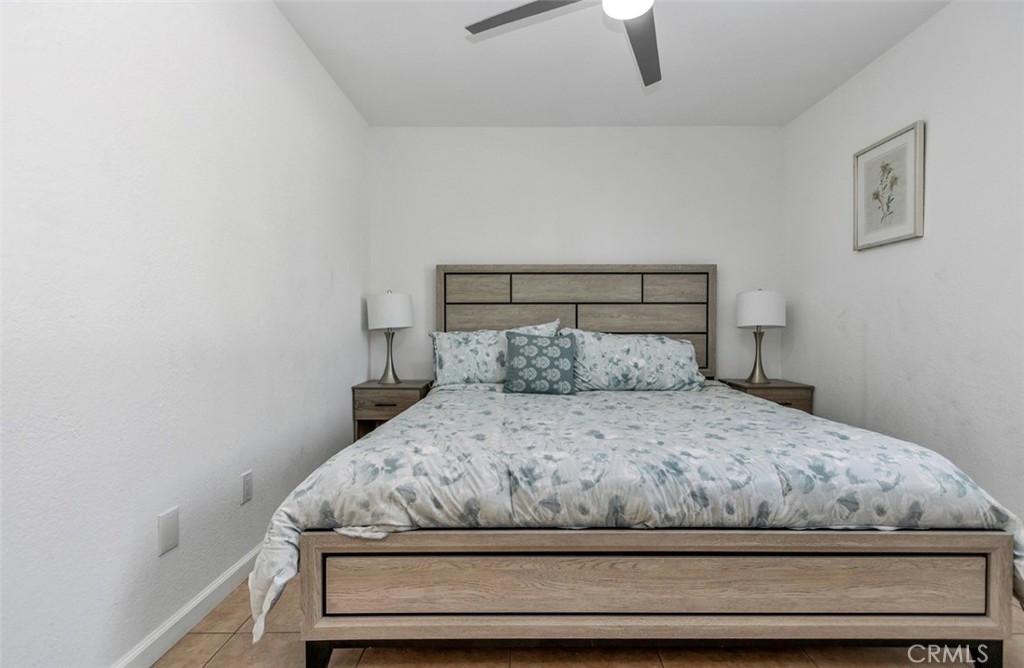 2230 North Volturno Road Palm Springs, CA 92262 - Photo 33 of 34 a bedroom with a bed and window