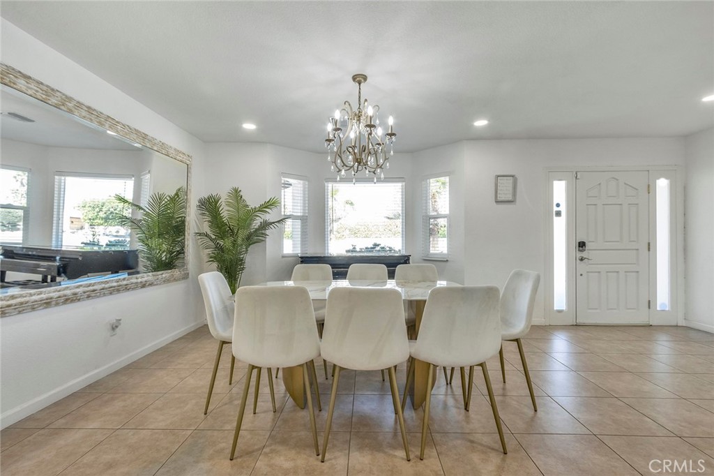 2230 North Volturno Road Palm Springs, CA 92262 - Photo 6 of 34 a view of a dining room with furniture and window
