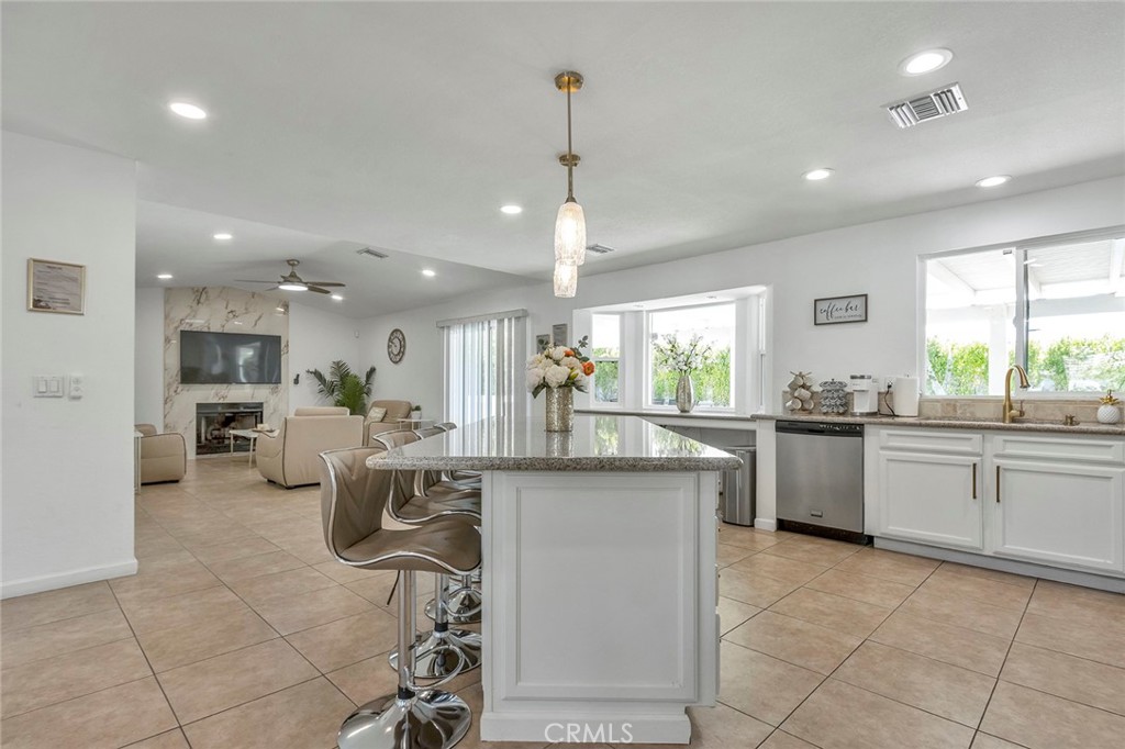 2230 North Volturno Road Palm Springs, CA 92262 - Photo 8 of 34 a kitchen with counter space appliances and a window