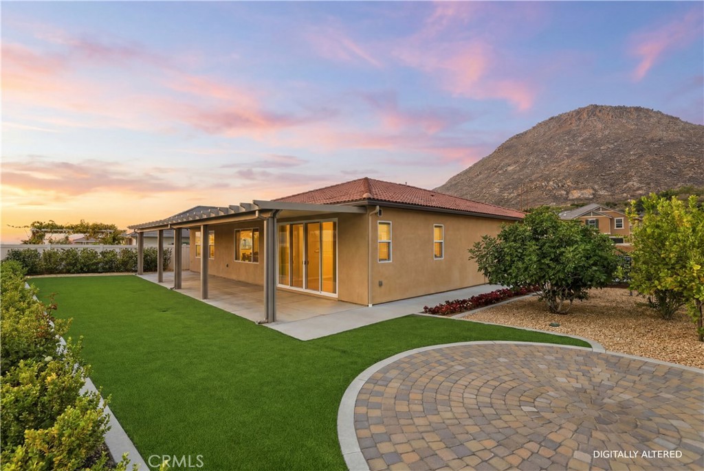 21159 Blue Jeans Court Riverside, CA 92507 - Photo 50 of 63 a view of a house with a yard
