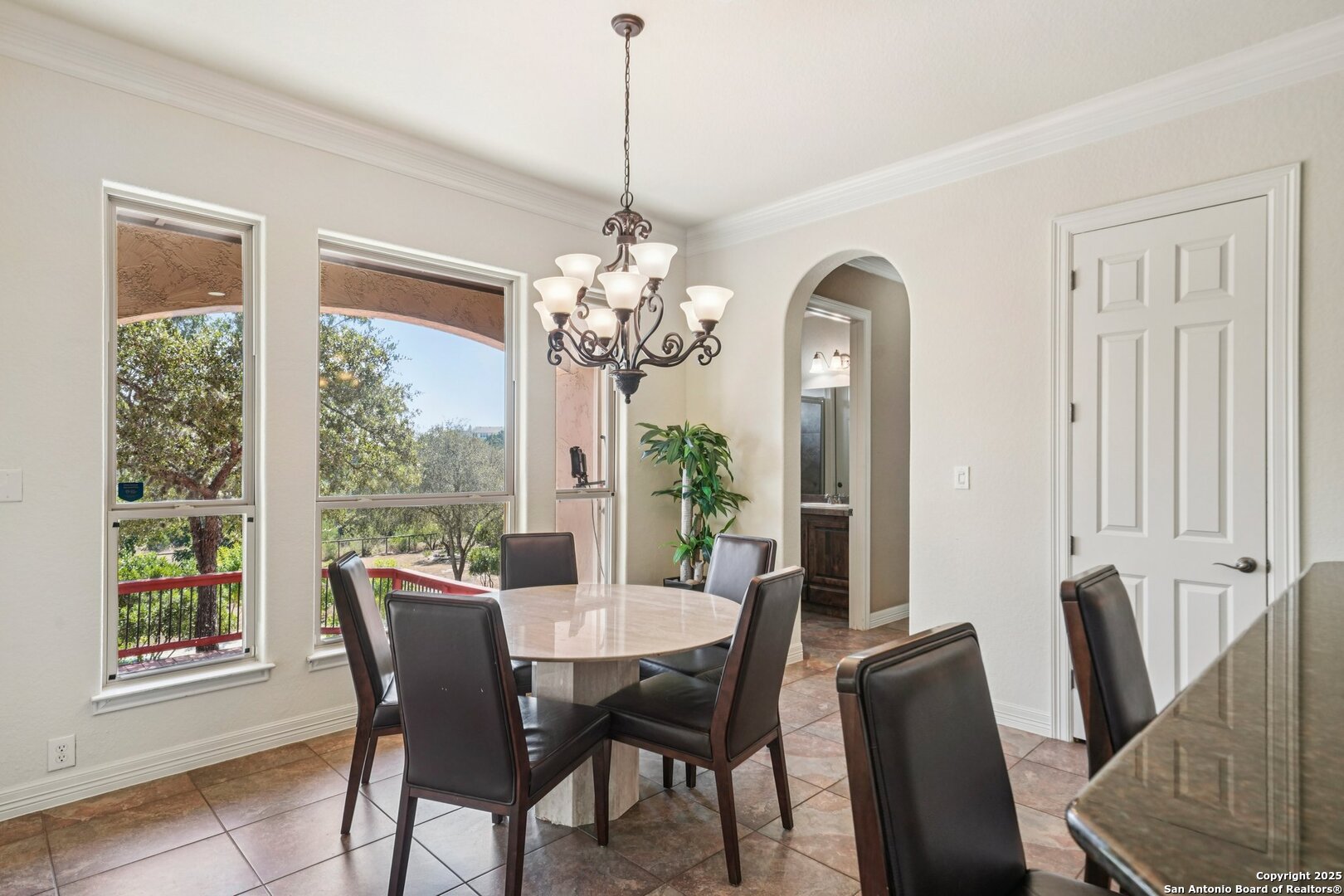 718 Ruidosa Downs Helotes, TX 78023 - Photo 12 of 50 a view of a dining room with furniture window and outside view