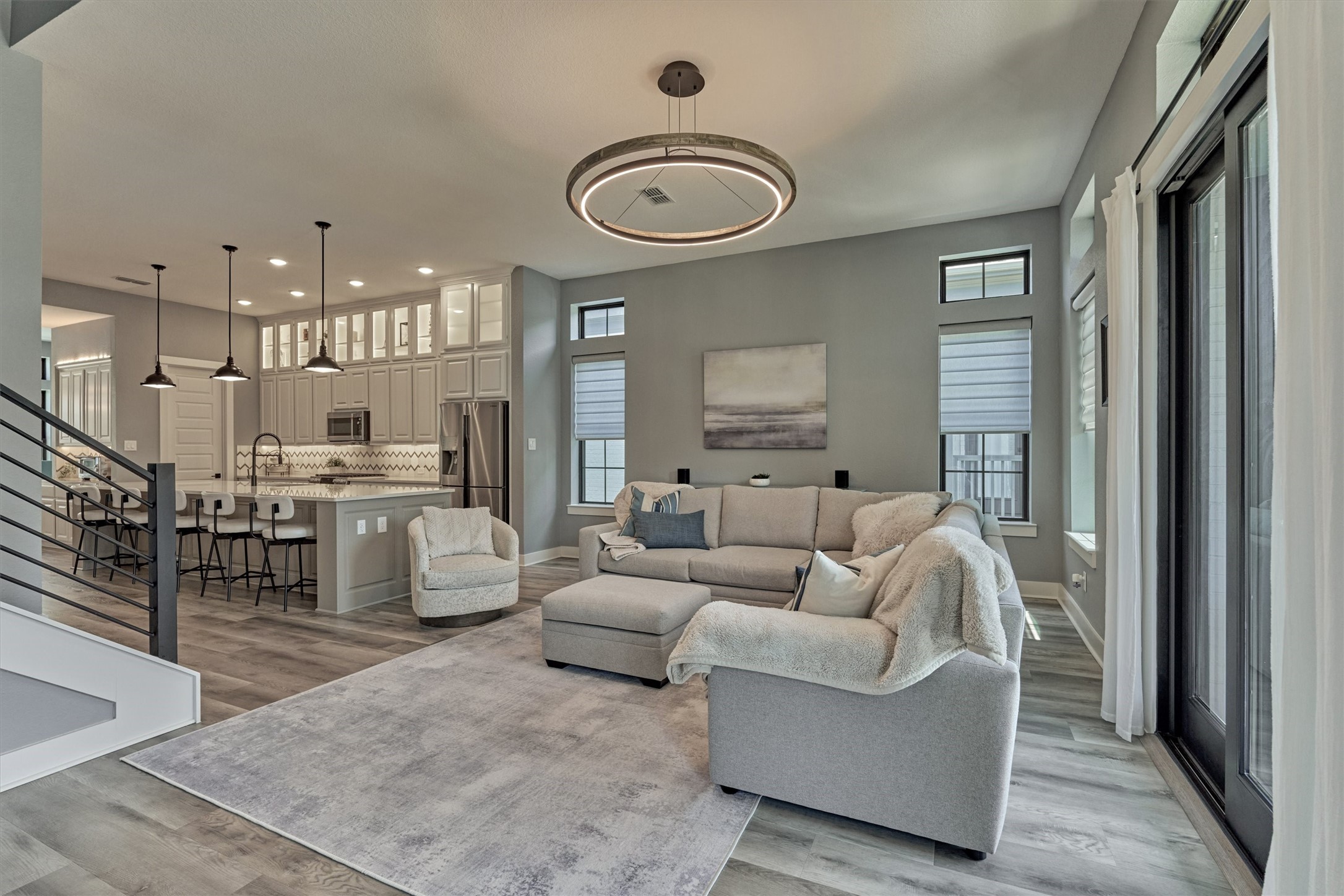 35 Amerson Bay Way Spring, TX 77380 - Photo 29 of 50 The large family room in the home with designer interior lighting and more. There is no carpet in the home.