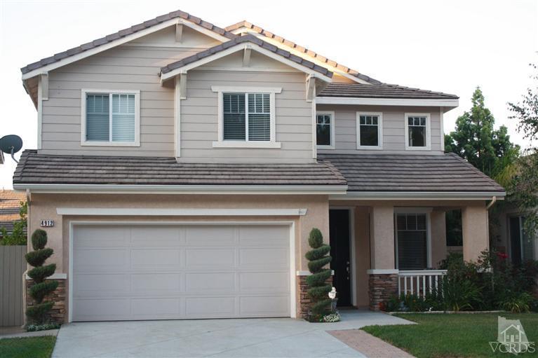 4912 Borders Street Simi Valley, CA 93063 - Photo 1 of 10 a view of a house with a yard and plants