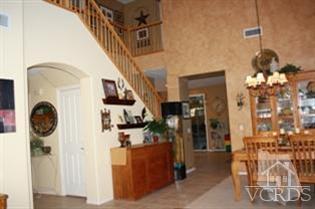 4912 Borders Street Simi Valley, CA 93063 - Photo 5 of 10 a view of a hallway with washer and dryer