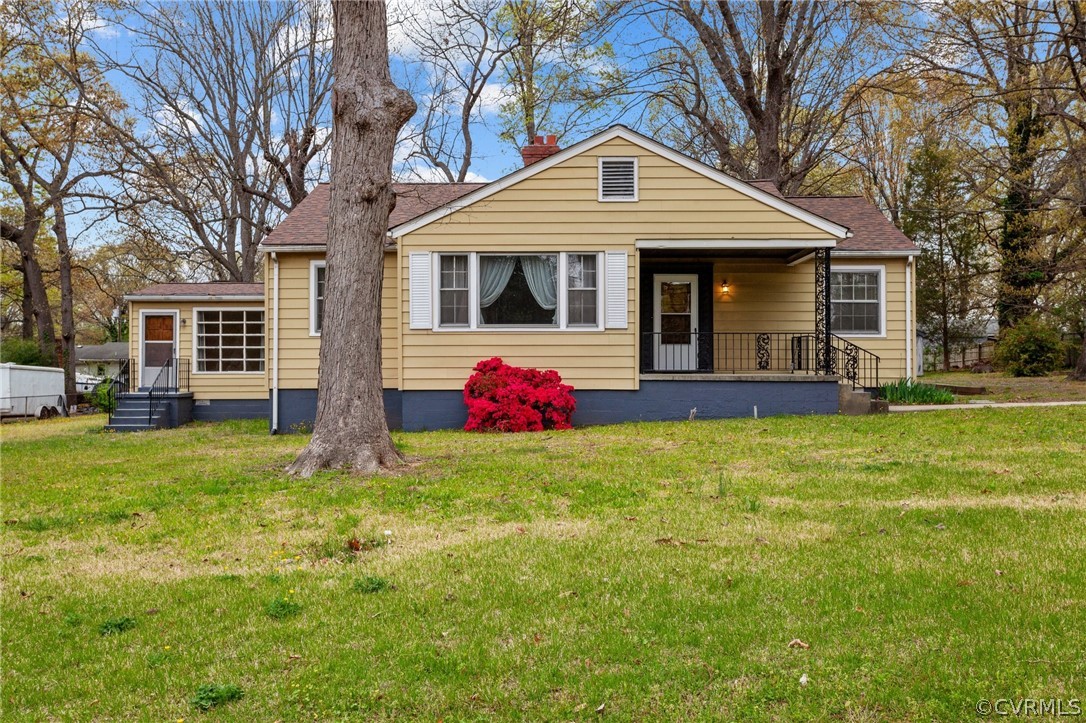 2916 Sherbourne Road North Chesterfield, VA 23237 - Photo 1 of 43 a front view of a house with a garden