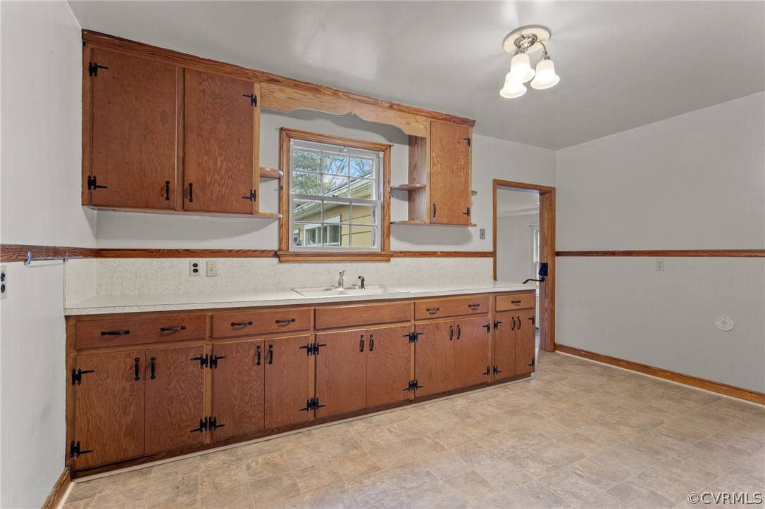 2916 Sherbourne Road North Chesterfield, VA 23237 - Photo 11 of 43 a spacious bathroom with a granite countertop sink and a mirror