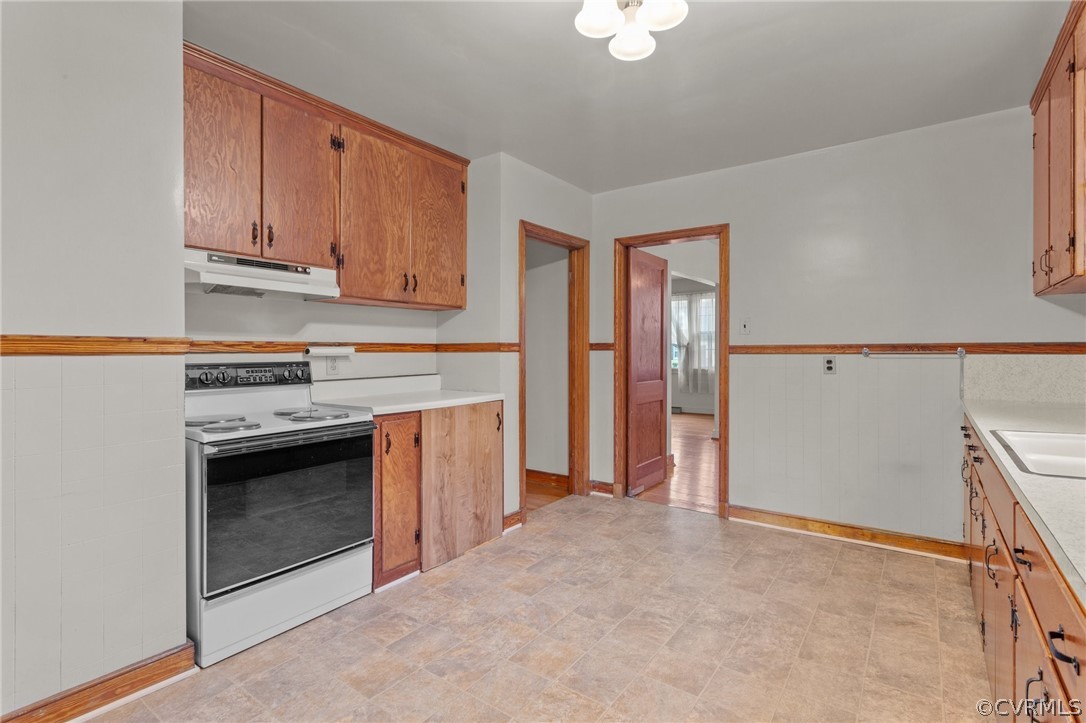 2916 Sherbourne Road North Chesterfield, VA 23237 - Photo 13 of 43 a kitchen with a stove and a refrigerator