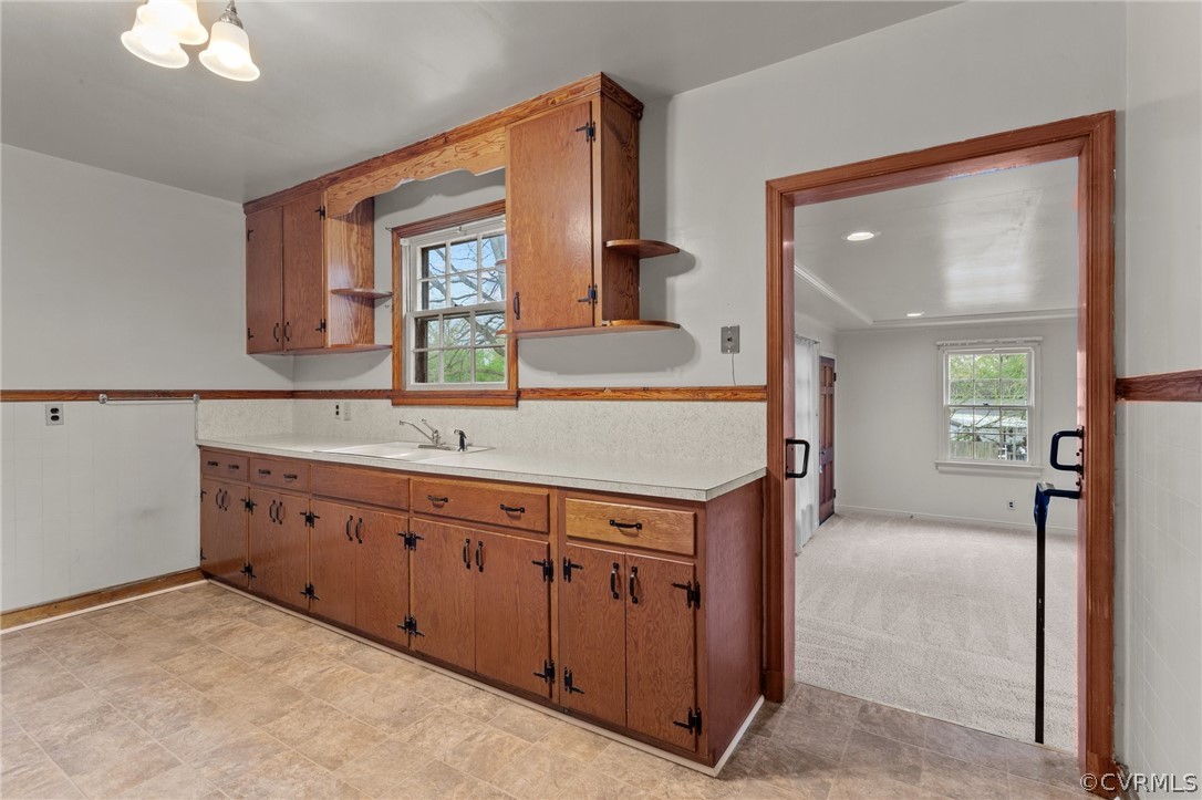 2916 Sherbourne Road North Chesterfield, VA 23237 - Photo 14 of 43 a spacious bathroom with a granite countertop sink and a mirror