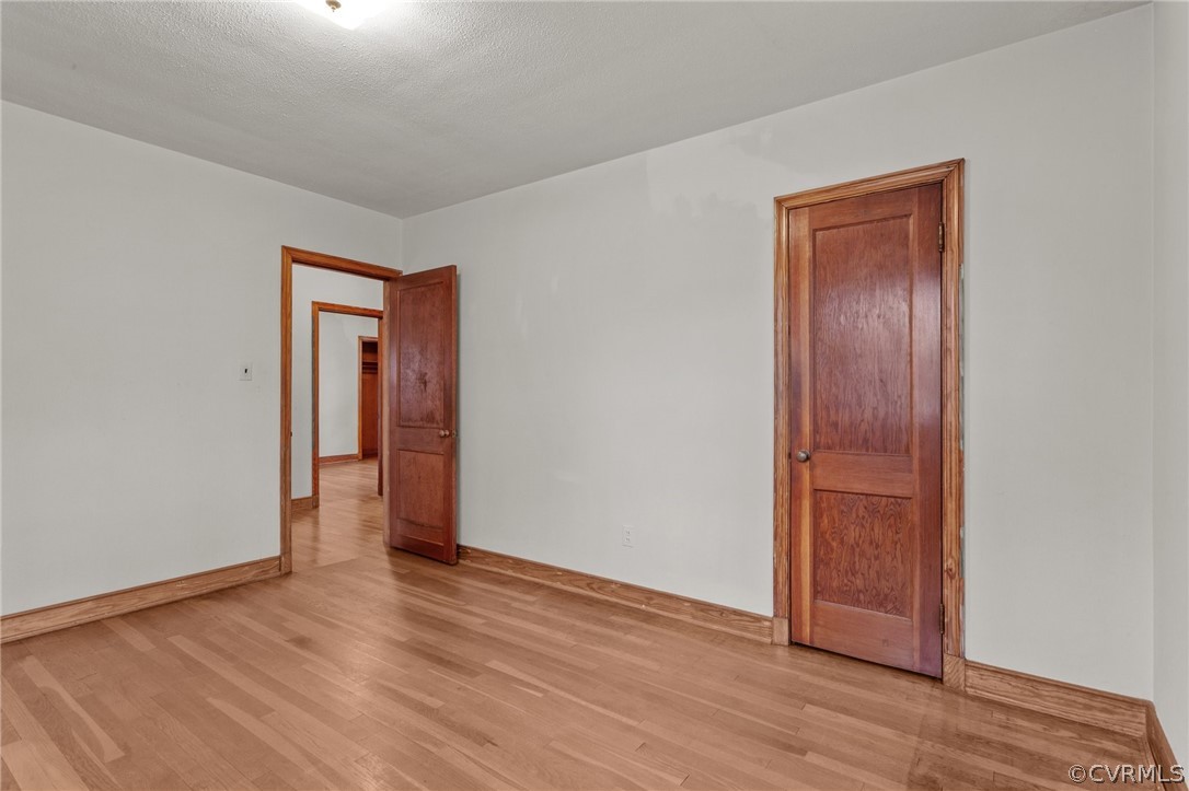 2916 Sherbourne Road North Chesterfield, VA 23237 - Photo 17 of 43 an empty room with wooden floor and closet