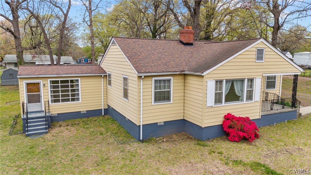 2916 Sherbourne Road North Chesterfield, VA 23237 - Photo 37 of 43 a front view of a house with a yard