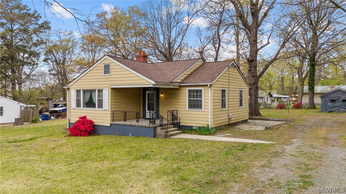 2916 Sherbourne Road North Chesterfield, VA 23237 - Photo 38 of 43 a front view of house with yard outdoor seating and barbeque oven
