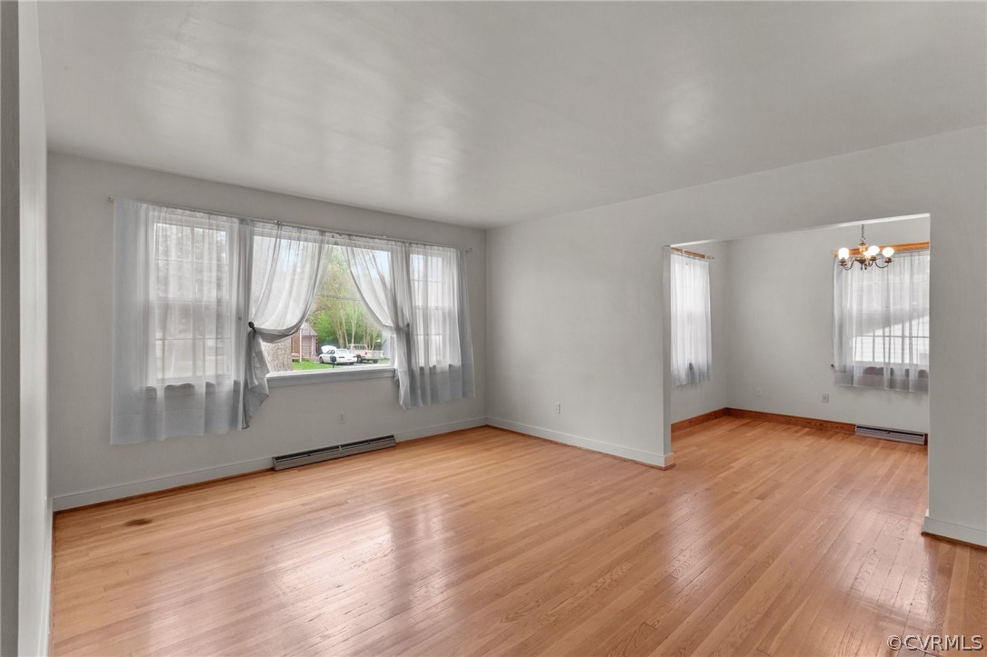 2916 Sherbourne Road North Chesterfield, VA 23237 - Photo 4 of 43 an empty room with wooden floor and windows