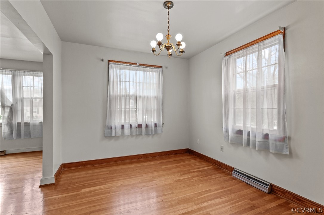 2916 Sherbourne Road North Chesterfield, VA 23237 - Photo 8 of 43 a view of an empty room with wooden floor and a window