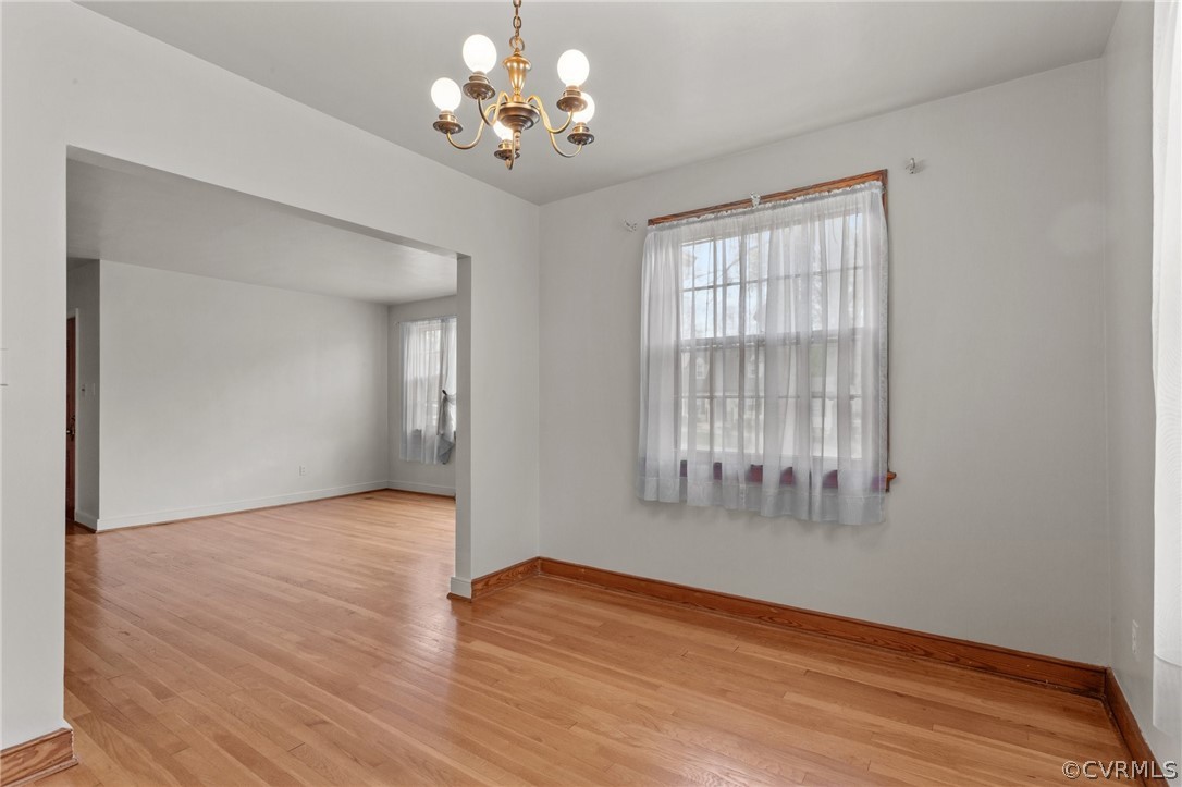 2916 Sherbourne Road North Chesterfield, VA 23237 - Photo 9 of 43 a view of an empty room with wooden floor and a window