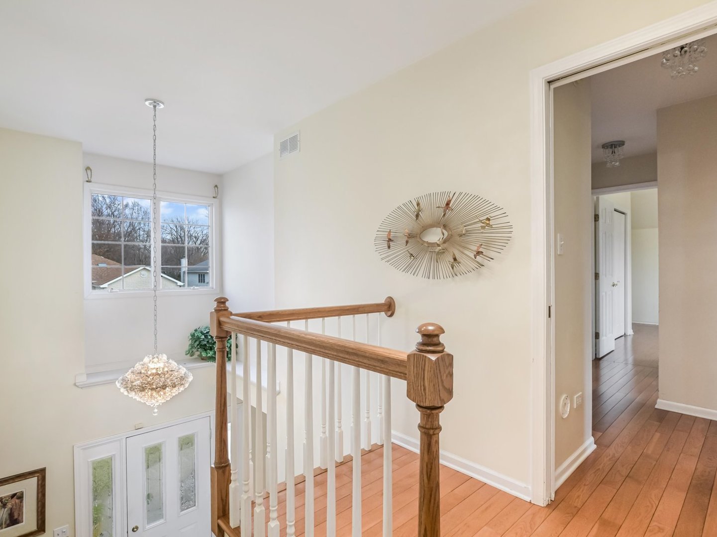 18036 Crystal Lane Lansing, IL 60438 - Photo 15 of 46 a view of a hallway view with wooden floor and staircase