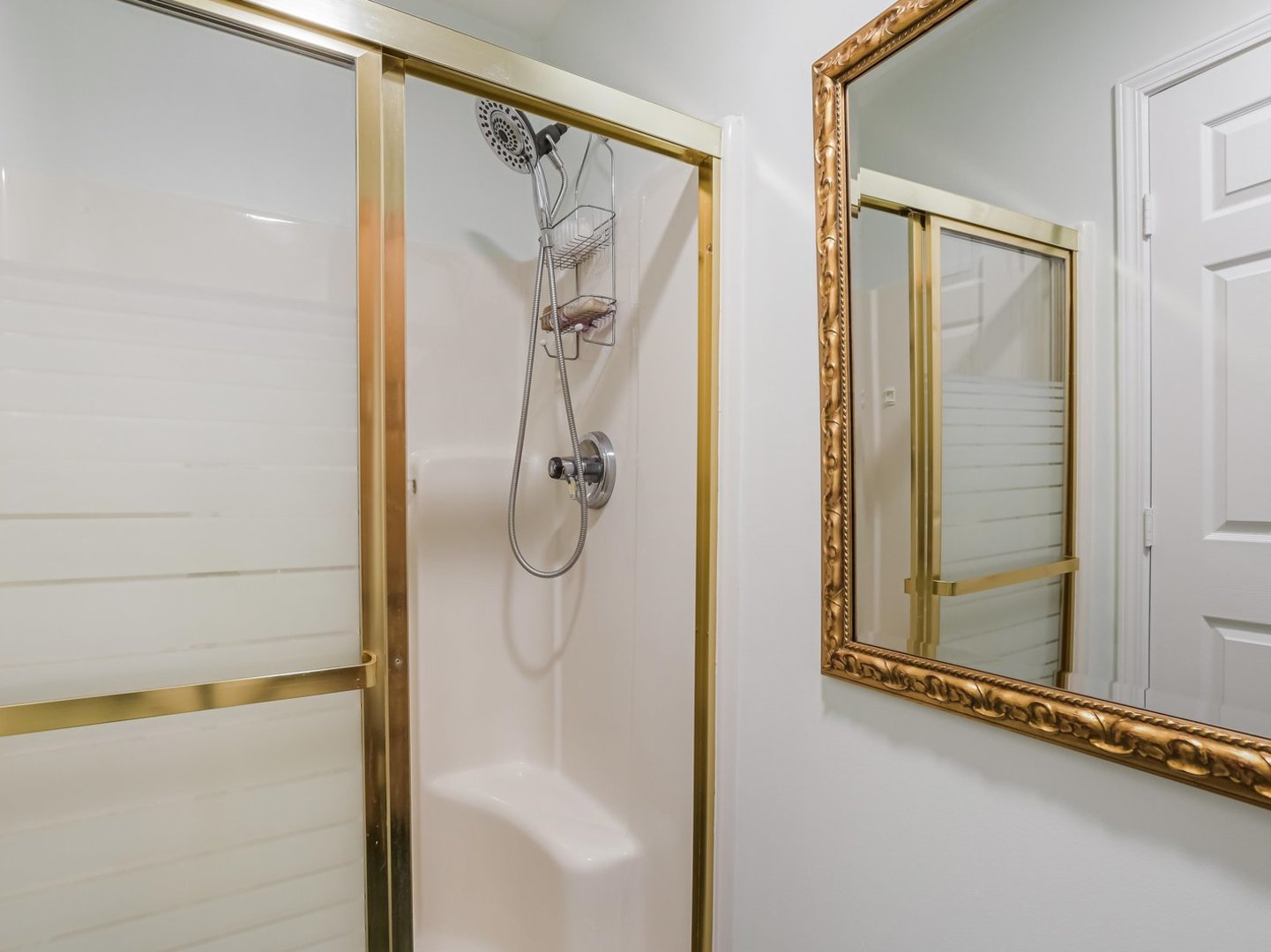 18036 Crystal Lane Lansing, IL 60438 - Photo 18 of 46 a bathroom with a shower and a glass door