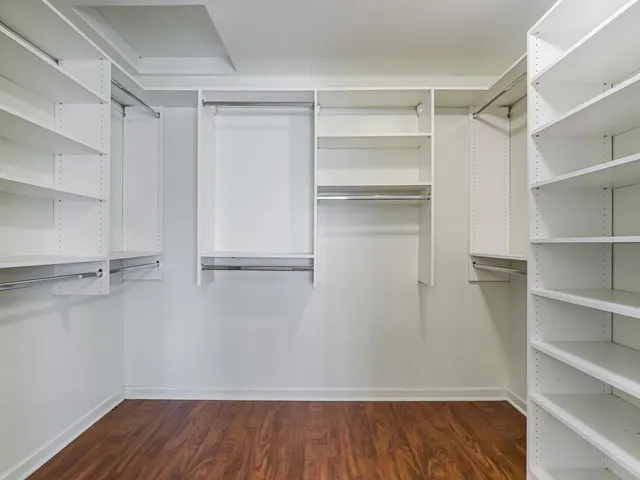a view of an empty walk in closet