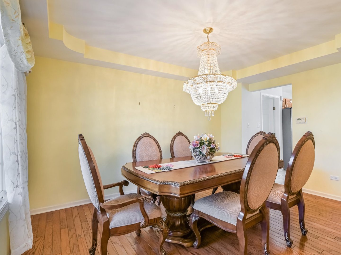 18036 Crystal Lane Lansing, IL 60438 - Photo 2 of 46 a dining room with furniture and window