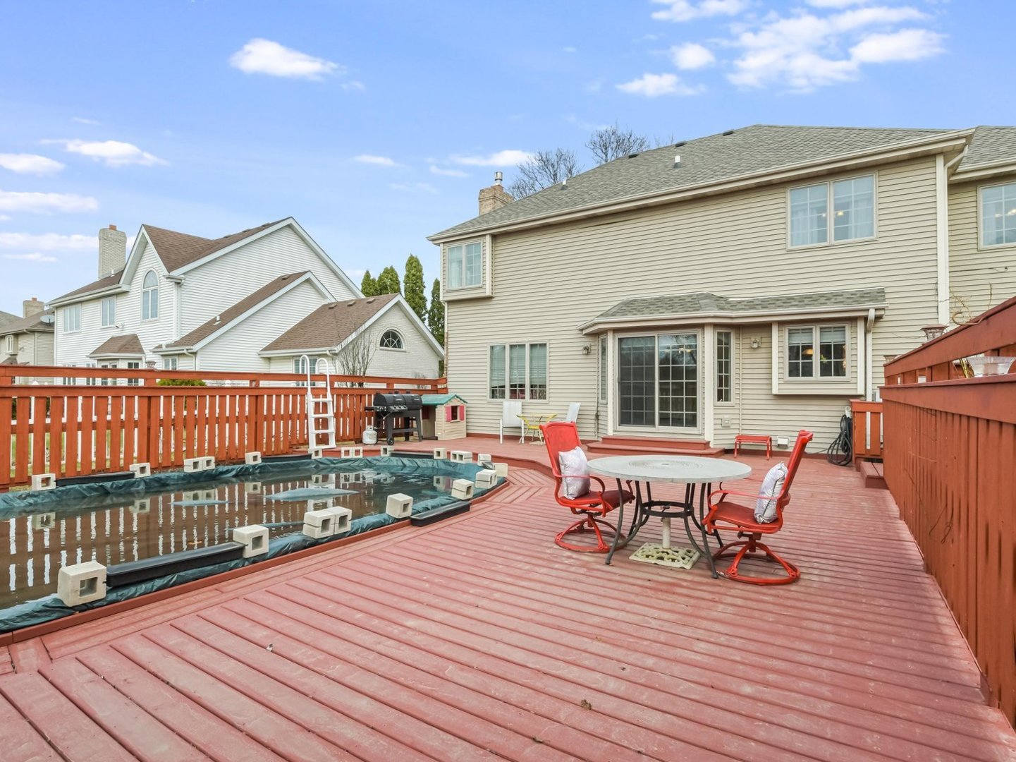 18036 Crystal Lane Lansing, IL 60438 - Photo 28 of 46 a view of a house with wooden deck and furniture