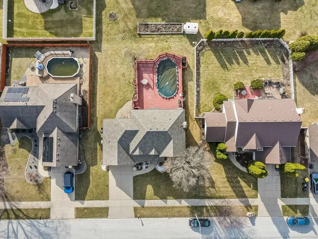 an aerial view of a fireplace with many windows