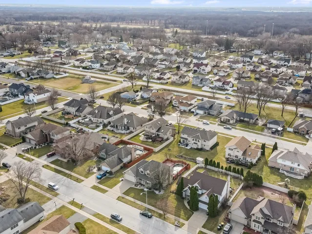 an aerial view of residential building and lake view