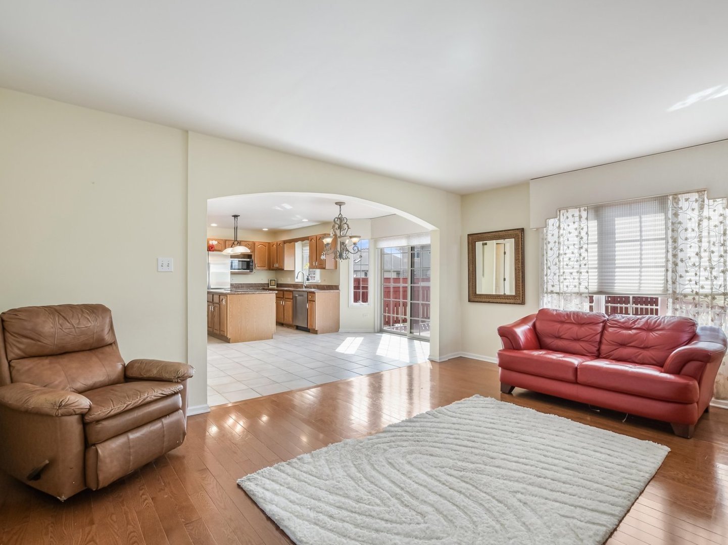 18036 Crystal Lane Lansing, IL 60438 - Photo 6 of 46 a living room with furniture and a large window