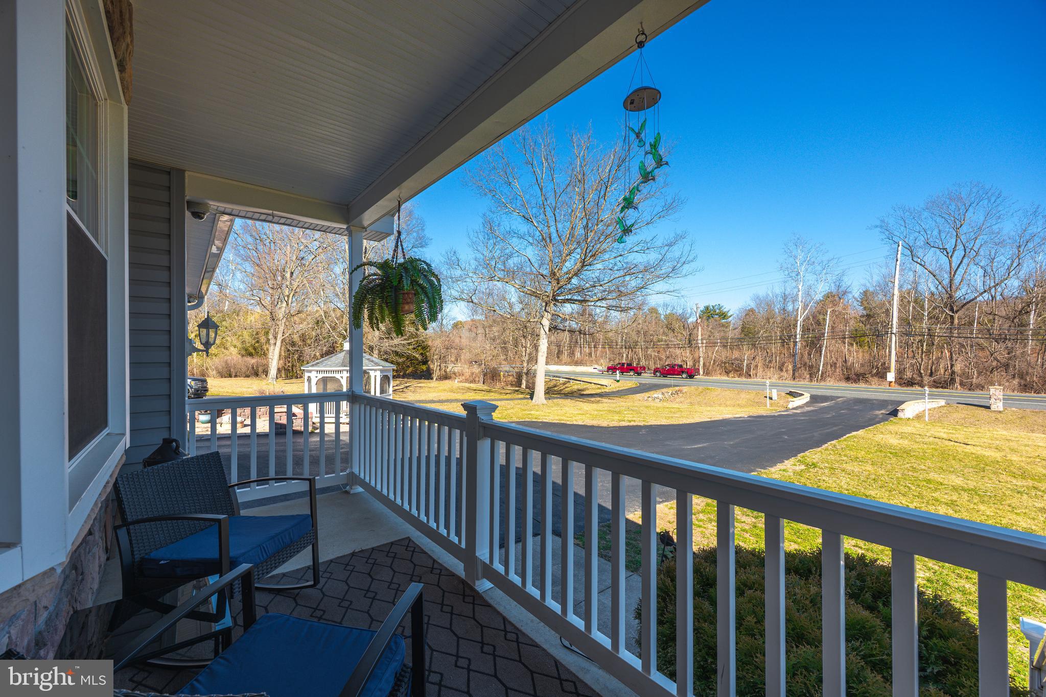 716 Paradise Road Aberdeen, MD 21001 - Photo 11 of 85 a view of balcony with wooden floor and outdoor seating