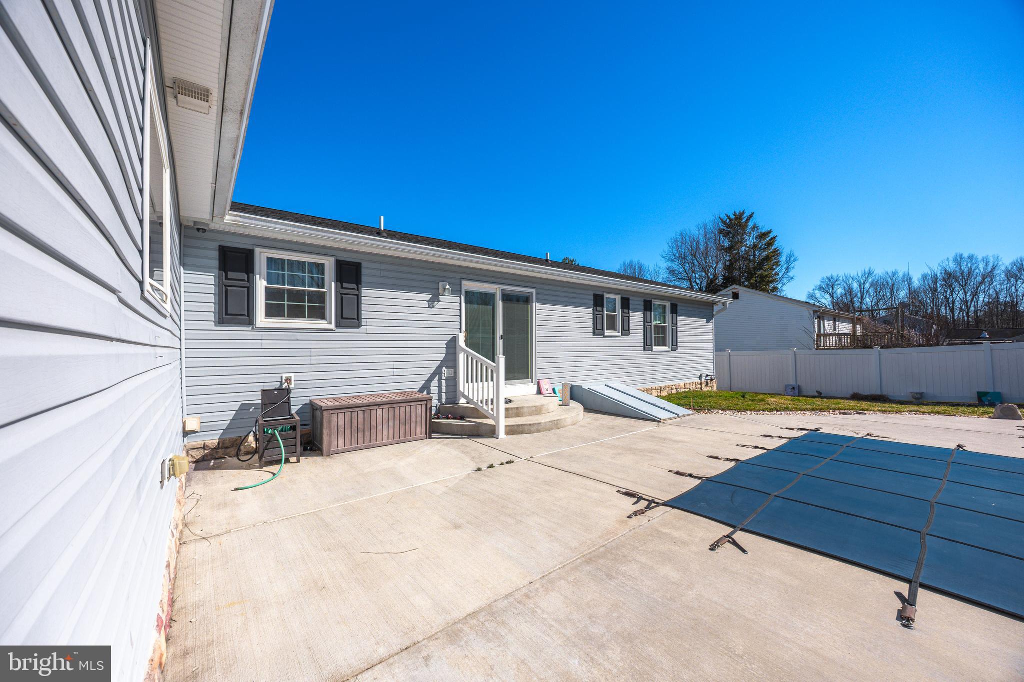 716 Paradise Road Aberdeen, MD 21001 - Photo 17 of 85 a view of a house with backyard and sitting area