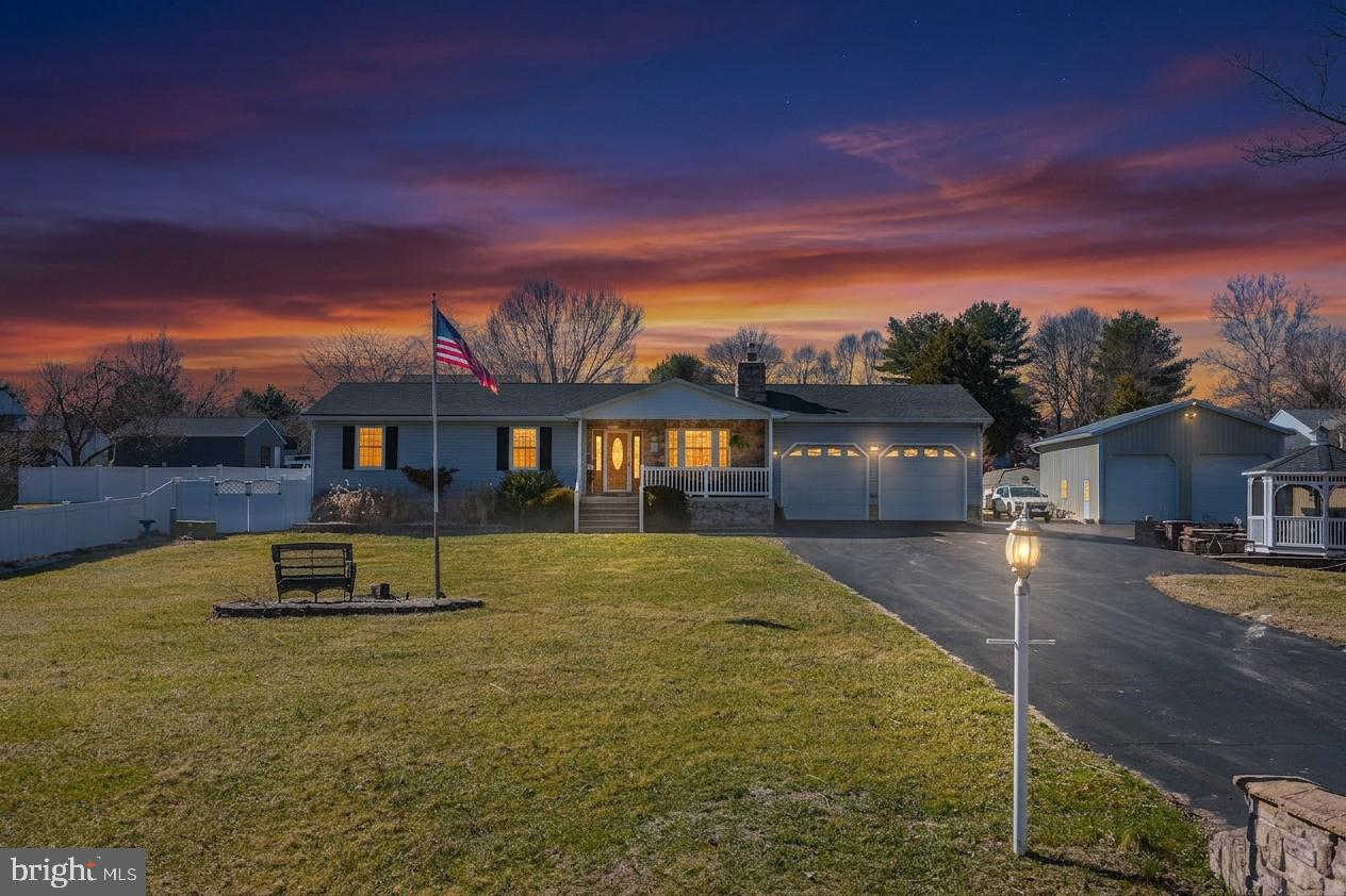716 Paradise Road Aberdeen, MD 21001 - Photo 2 of 85 a front view of a house with a yard