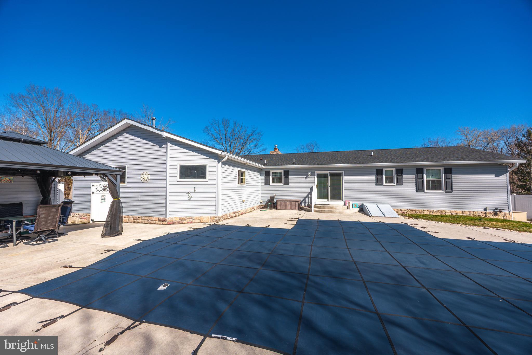 716 Paradise Road Aberdeen, MD 21001 - Photo 22 of 85 a front view of house with yard and porch