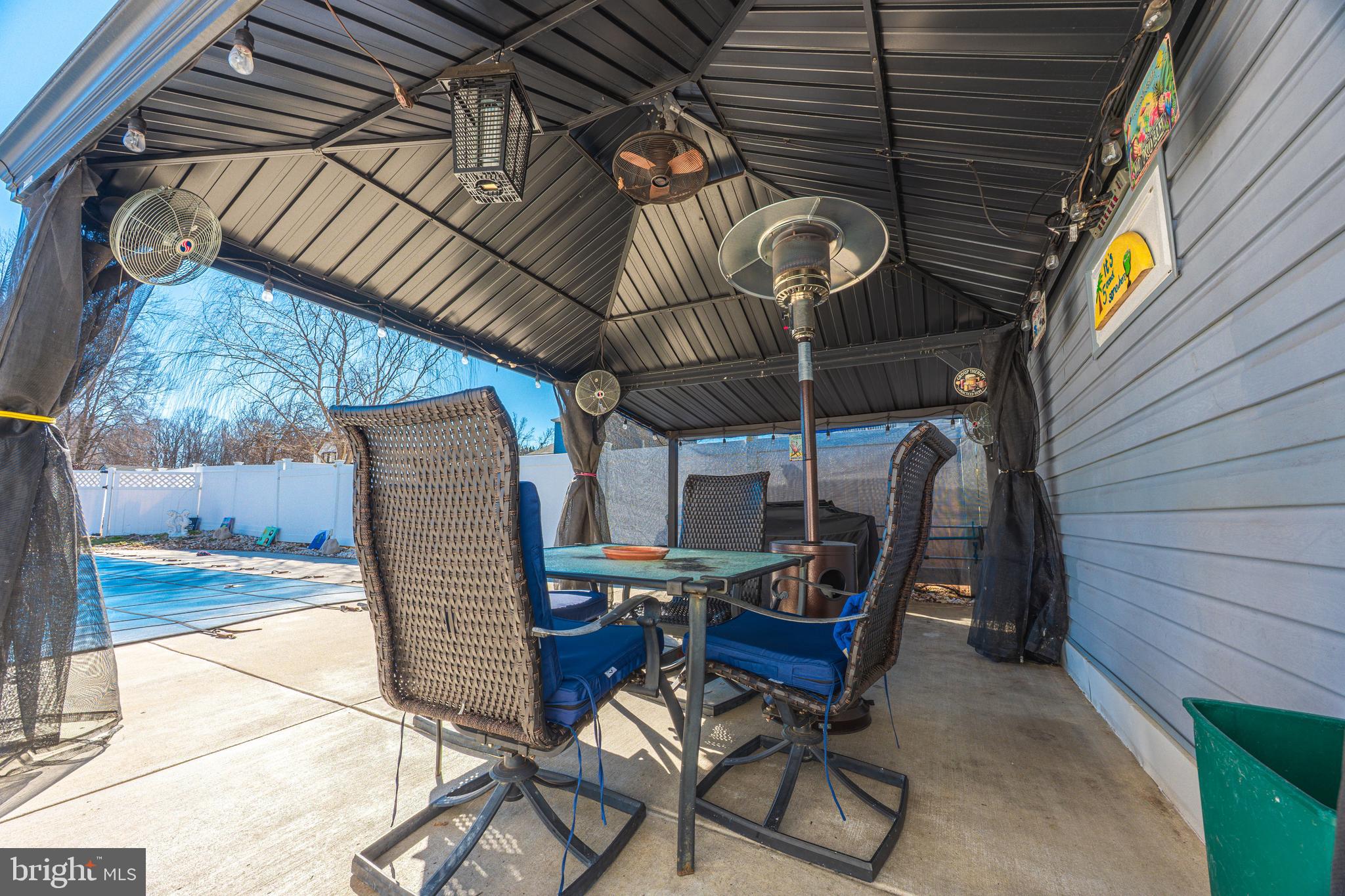 716 Paradise Road Aberdeen, MD 21001 - Photo 28 of 85 a view of a chairs and table in the roof deck