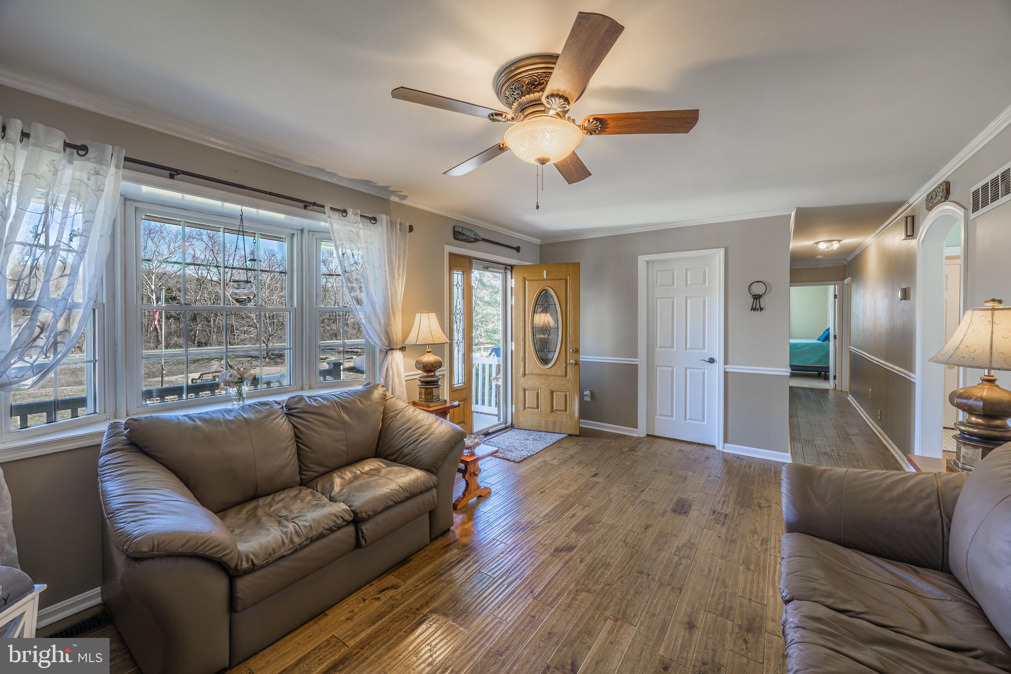 716 Paradise Road Aberdeen, MD 21001 - Photo 33 of 85 a living room with furniture and a large window