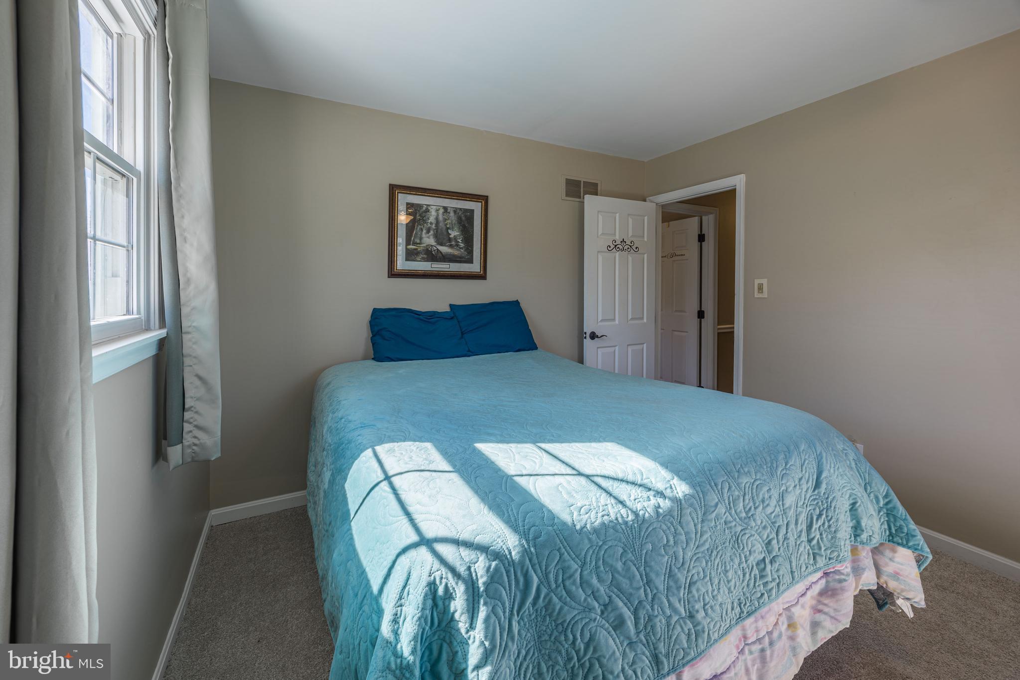 716 Paradise Road Aberdeen, MD 21001 - Photo 55 of 85 a bedroom with a bed and a window